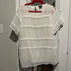 City Chic blouse with lace lining. This is a great piece to add to your closet.